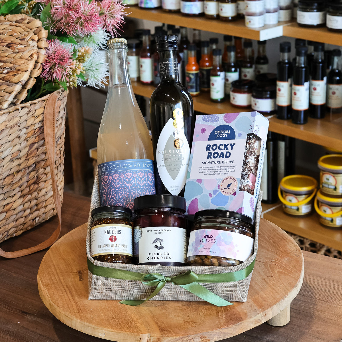 The quintessential hamper of
Mudgee Region goodness.

Wine that won’t be stored
away later and a range of complementing products.

All up a bundle of delicious
delights from just a few of our many local producers.

Recommended to be enjoyed
with good company for optimum enjoyment.