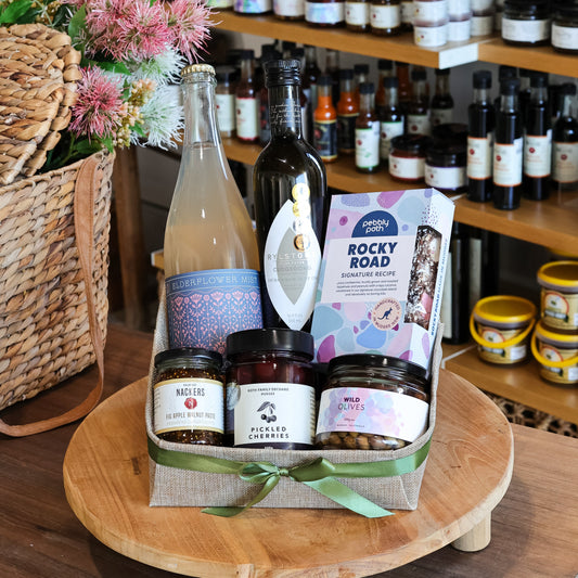 The quintessential hamper of
Mudgee Region goodness.

Wine that won’t be stored
away later and a range of complementing products.

All up a bundle of delicious
delights from just a few of our many local producers.

Recommended to be enjoyed
with good company for optimum enjoyment.
